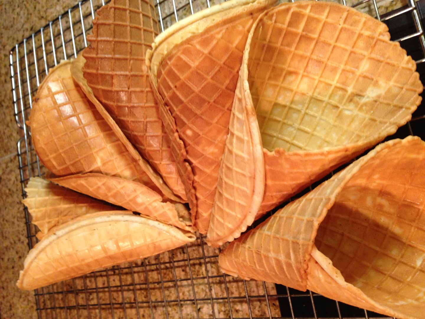 Golden waffle cones in a wire basket